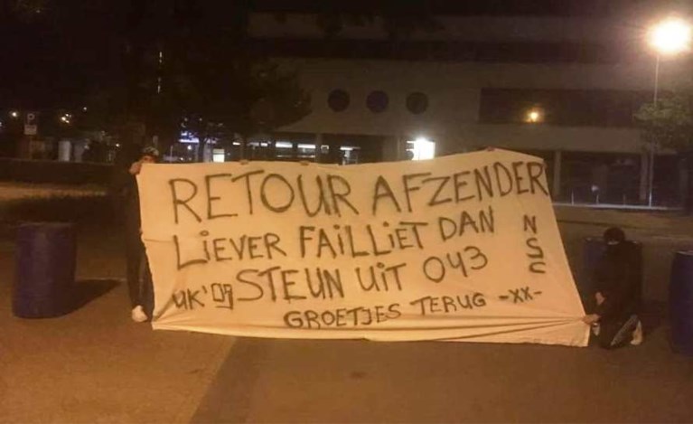 Spandoekenstrijd met humor tussen fans van MVV en Roda