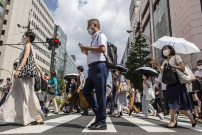 Zo groot is het contrast in Tokio: sfeerloze, lege stadions en drukke, levendige straten in een ‘lockdown light’